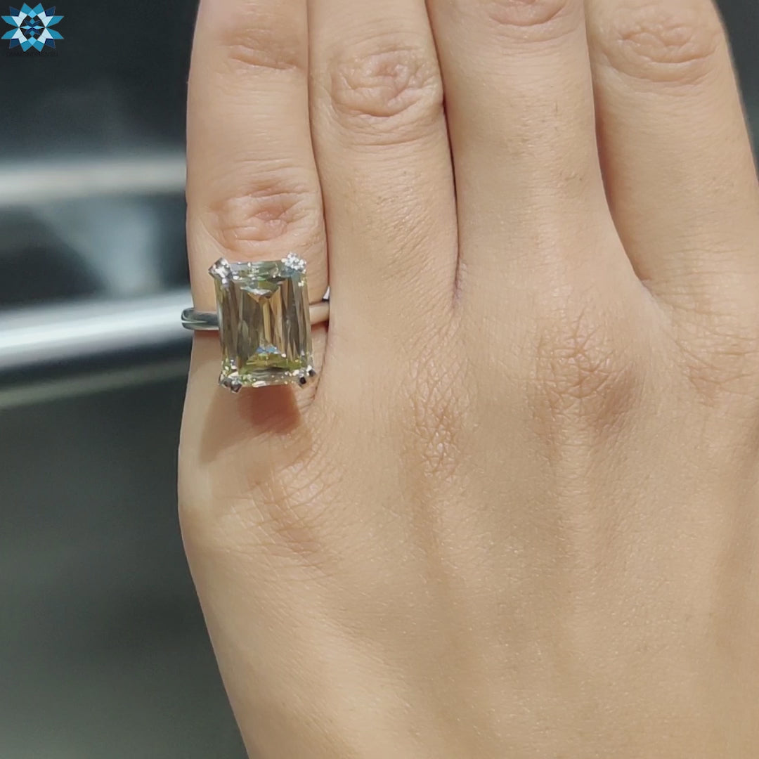 Double prong solitaire ring with criss cut center stone.