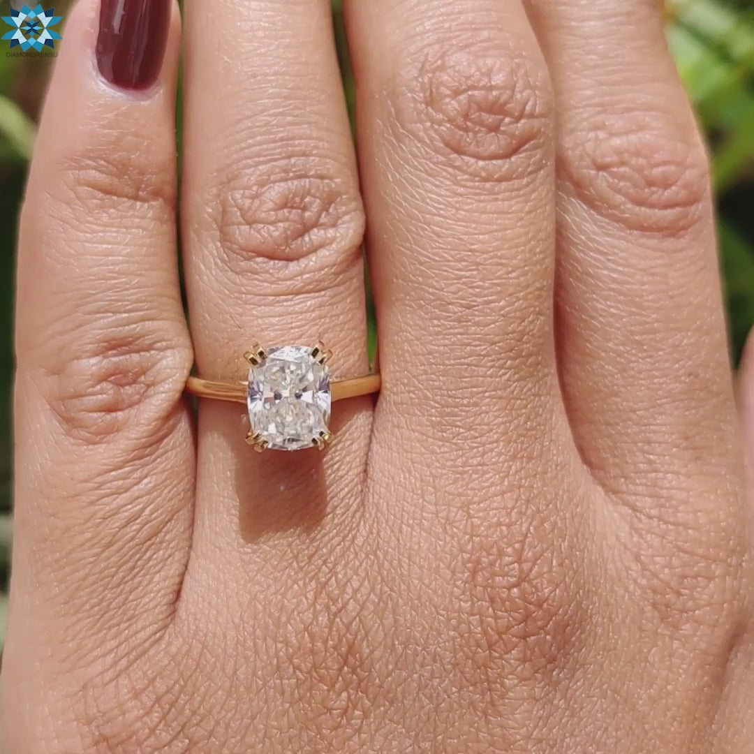 Cushion cut solitaire ring UK.