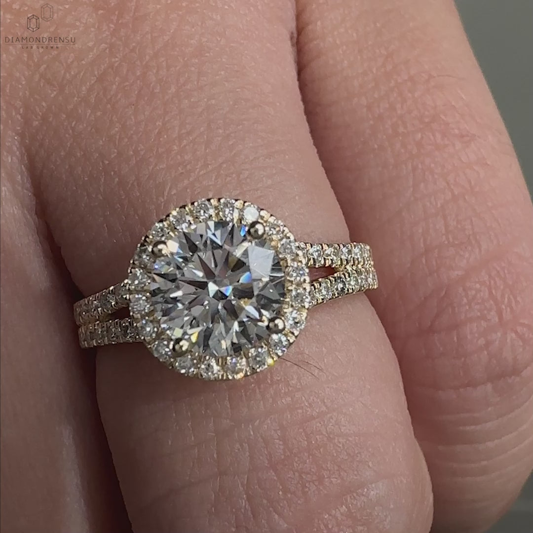 Round diamond center stone with pave band.