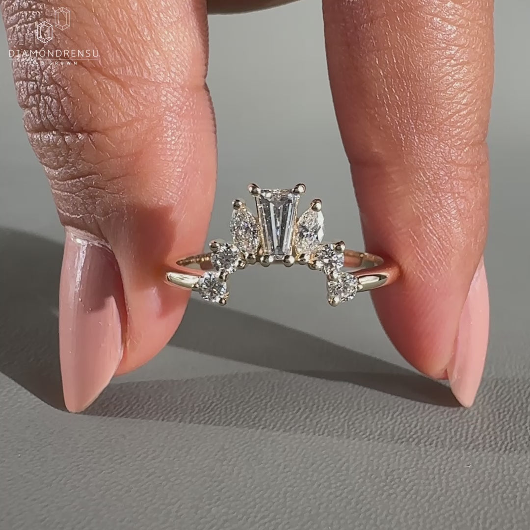 Marquise wedding band with round diamond
