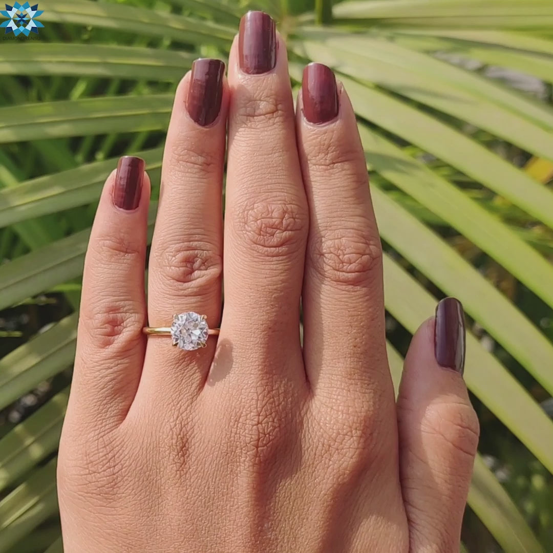 Buy moissanite ring with 4 claw prong and round center.