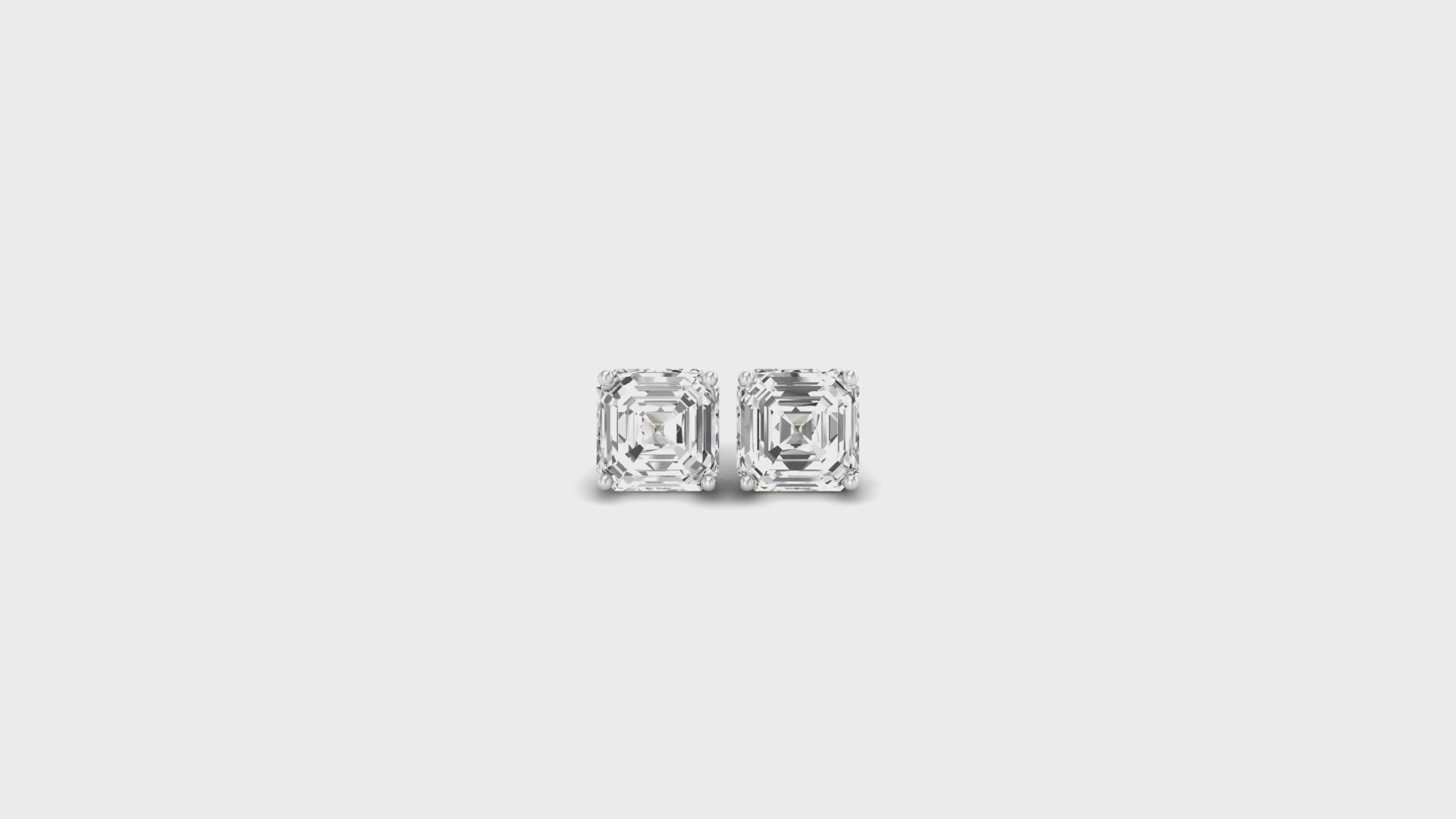 Lab grown diamond earrings set in gold studs.