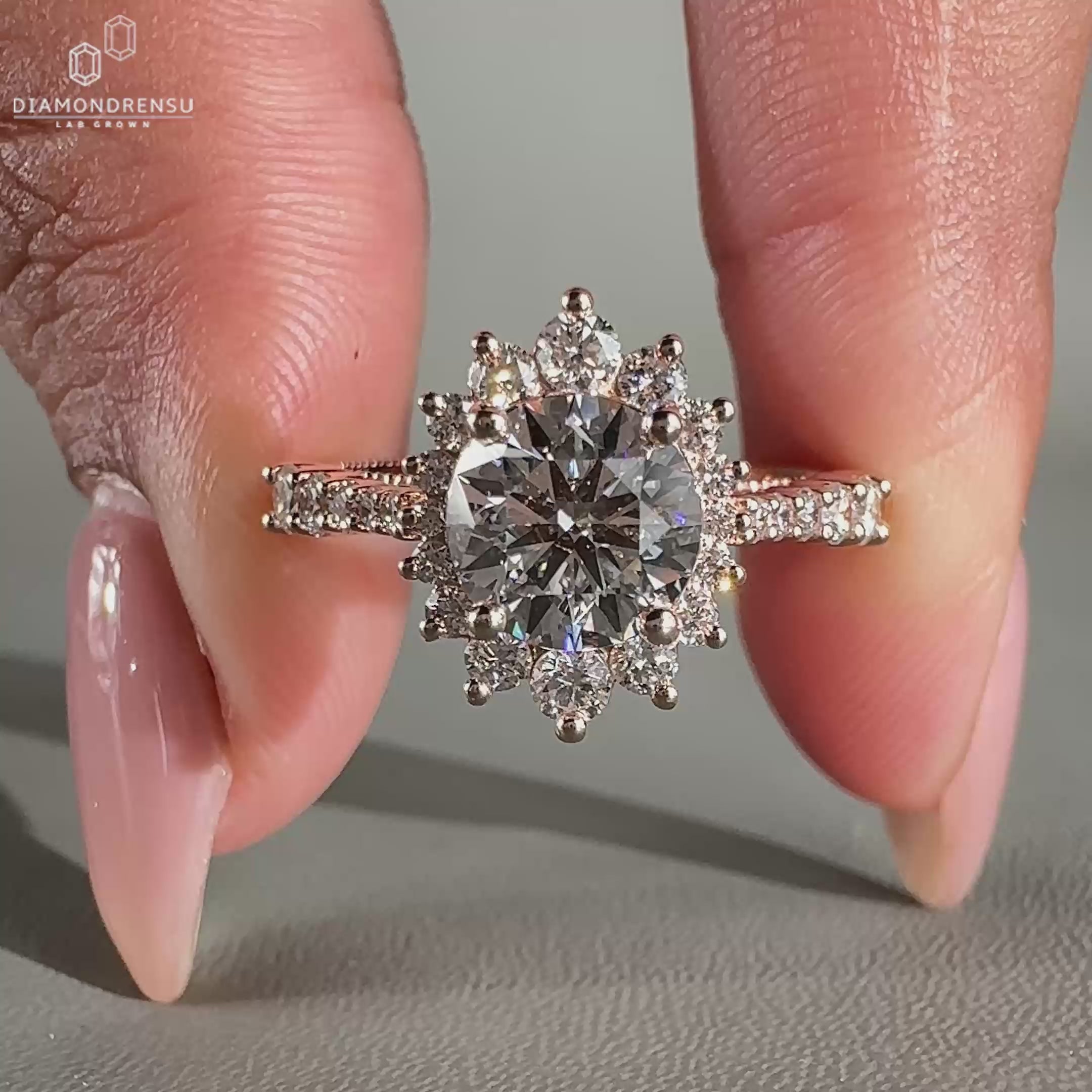 Halo diamond ring crafted in elegant rose gold.