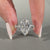 Marquise cut diamond ring featuring a hidden halo.