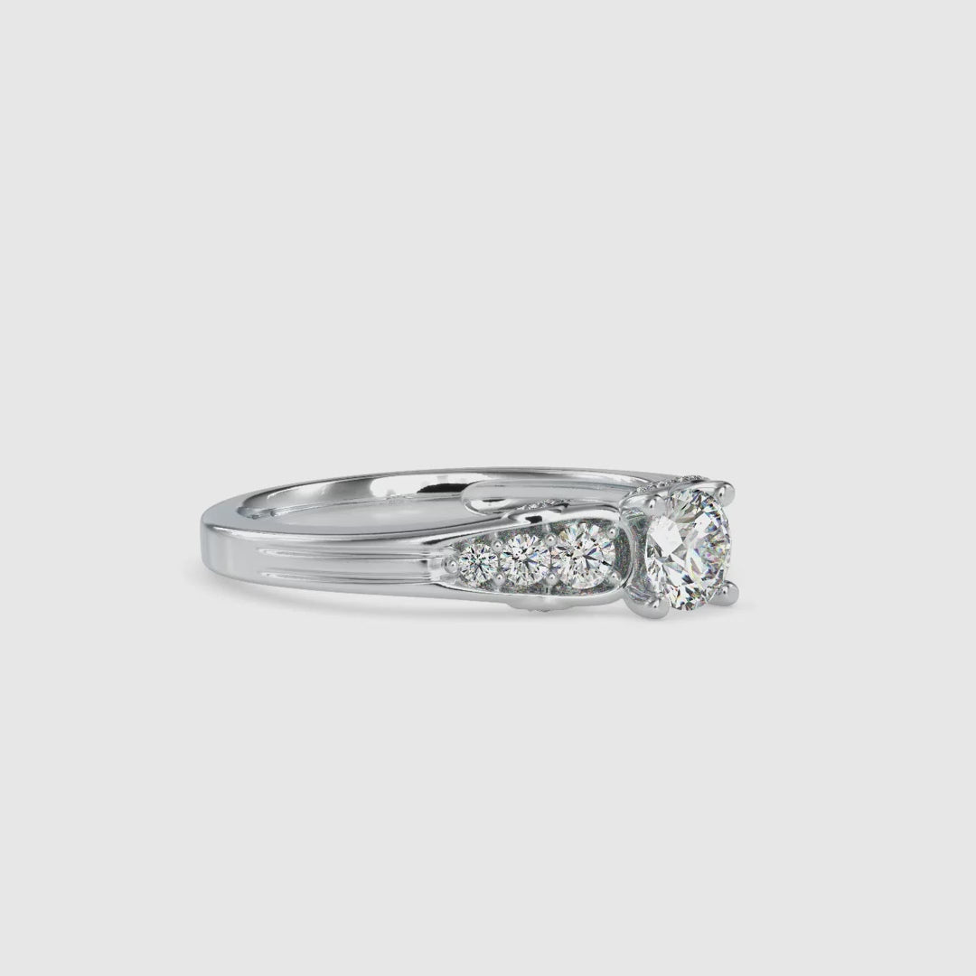 Brilliant cut diamond set in custom 7 stone rose gold ring.