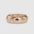 Custom lab grown flush wedding band in rose gold.