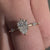 Pave diamond ring paired with a unique engagement ring design, ideal for women who prefer distinct styles.