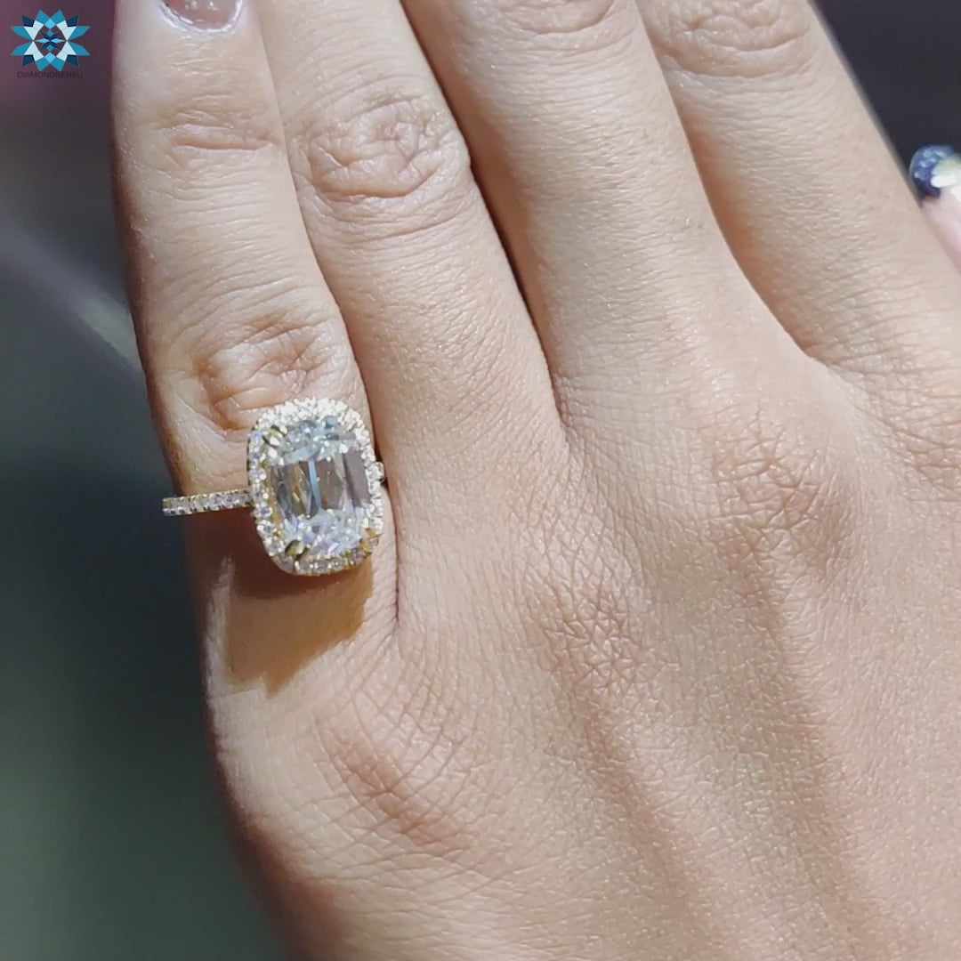 Yellow gold ring with old European cut moissanite.