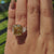 Handmade jewelry ring with double claw prong setting.