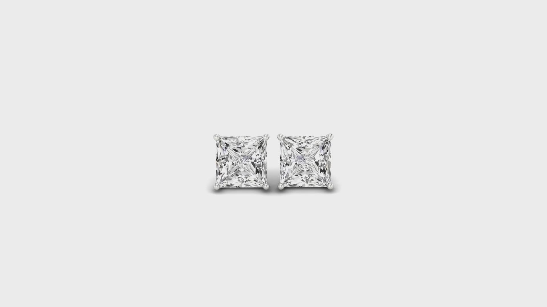 Princess cut diamond stud earrings in white gold with screw back design.