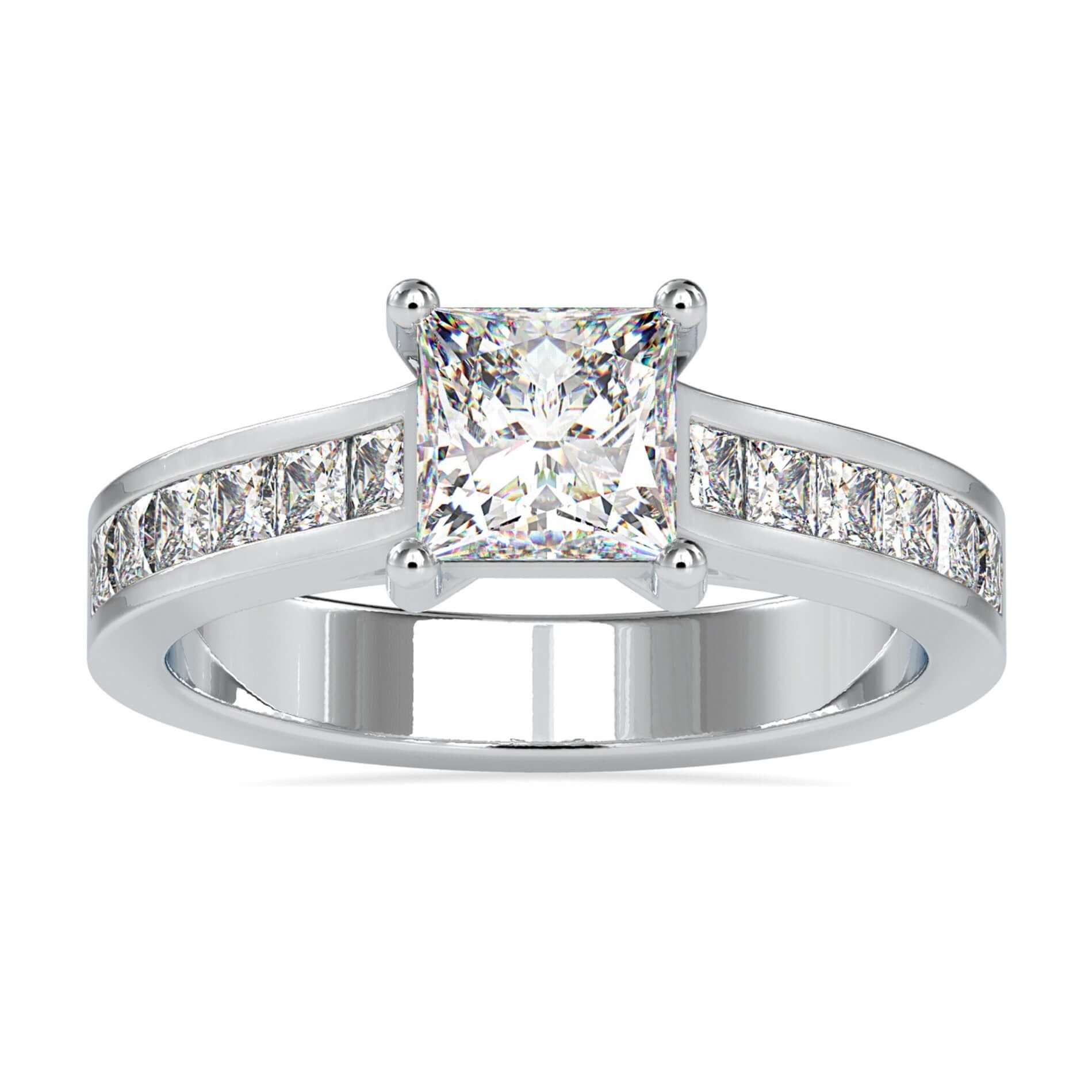 Princess cut engagement ring in yellow gold with channel set band.