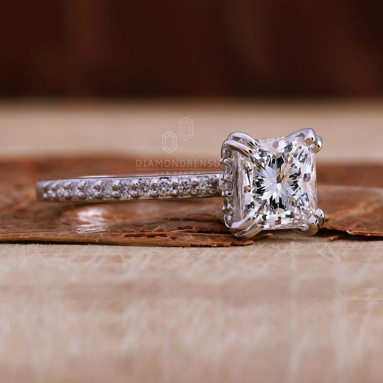 Engagement ring with pave accents showcasing a modern and elegant touch
