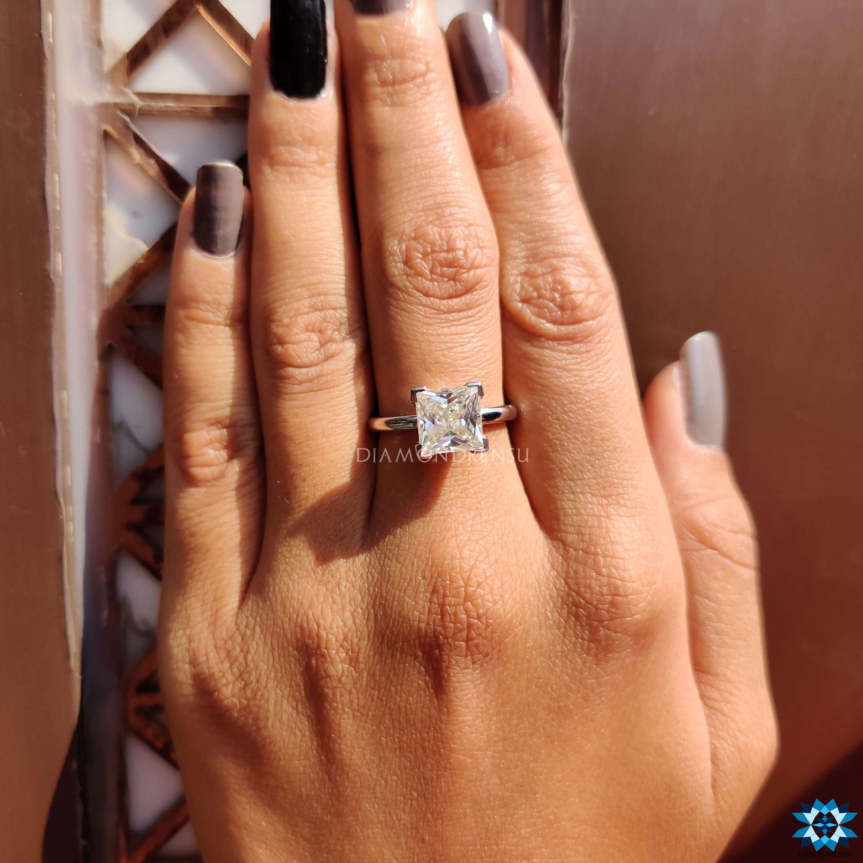 Handmade jewellery featuring princess cut moissanite.