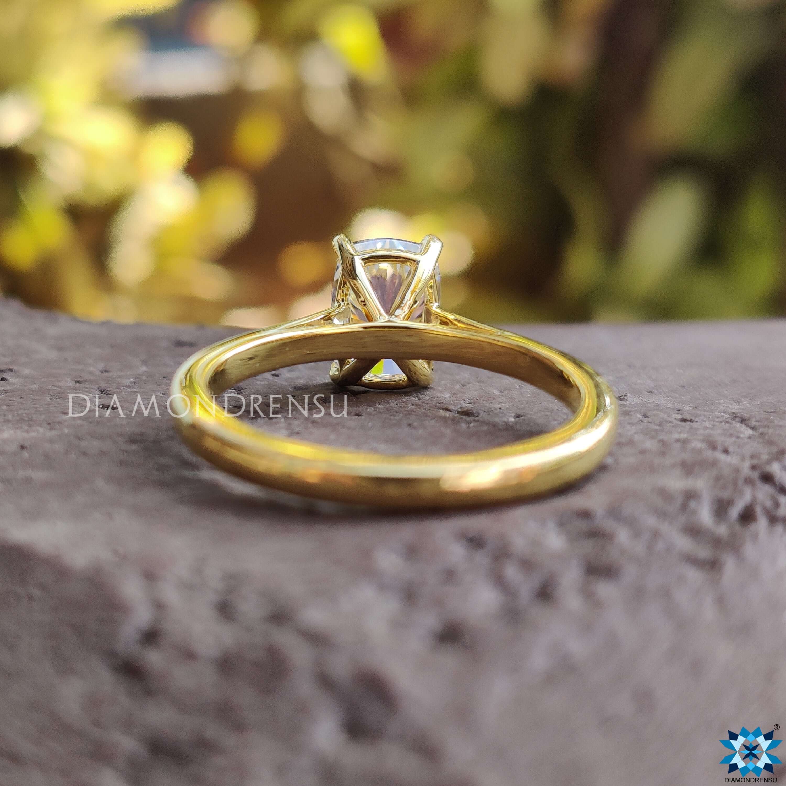 Elegant cathedral setting moissanite ring, perfect for modern proposals.