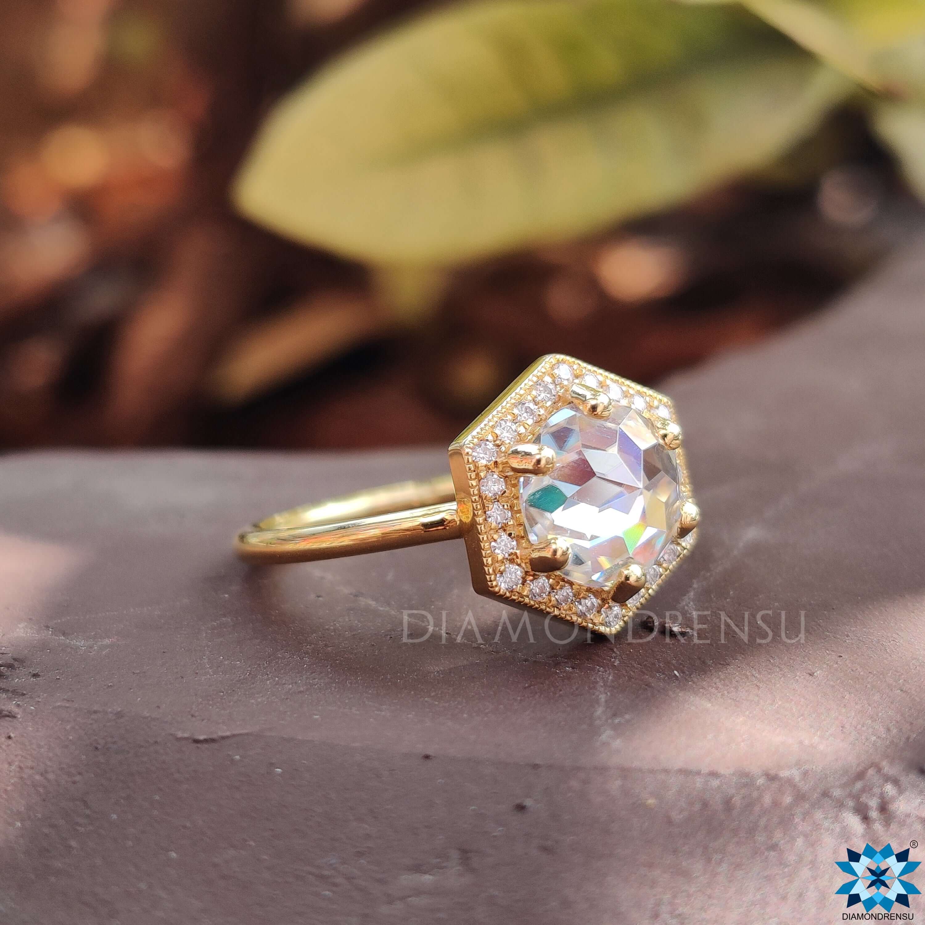 Yellow gold ring with rose cut moissanite.