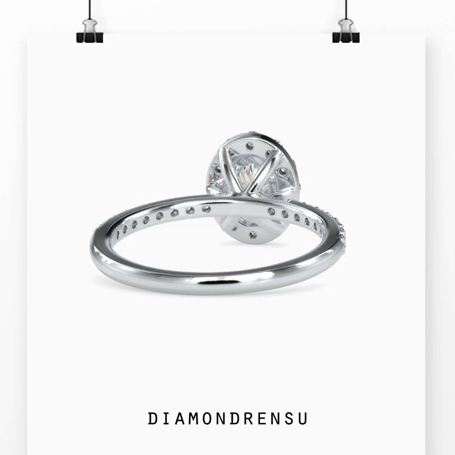 Round cut pave band paired with oval halo diamond ring.