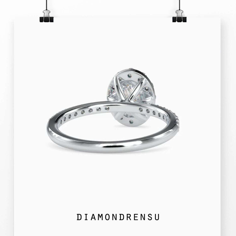 Round cut pave band paired with oval halo diamond ring.