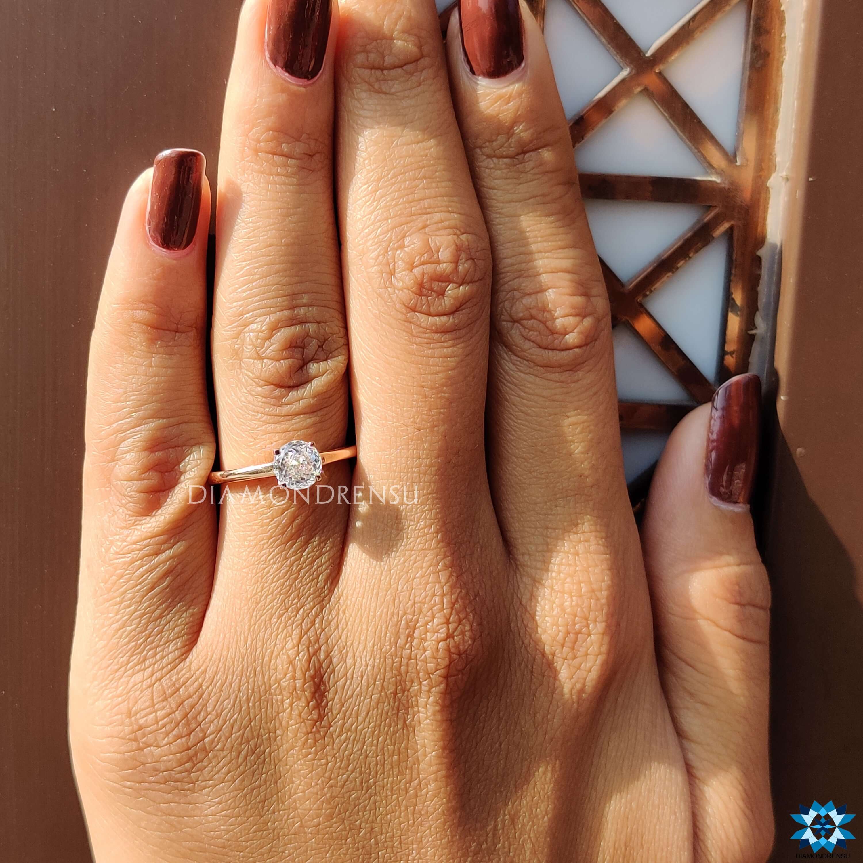 Custom engagement ring with Portuguese cut moissanite.