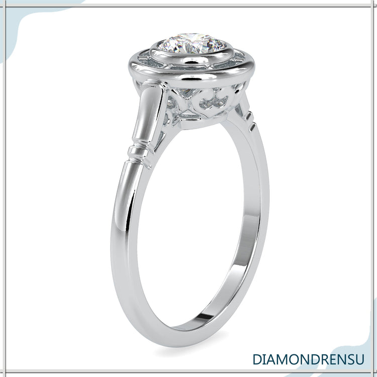 Rose gold engagement ring with minimalist bezel setting.
