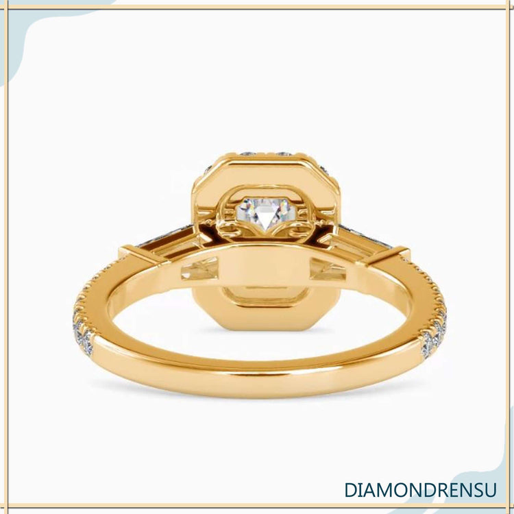 Diamondrensu UK ring featuring tapered baguette accents.