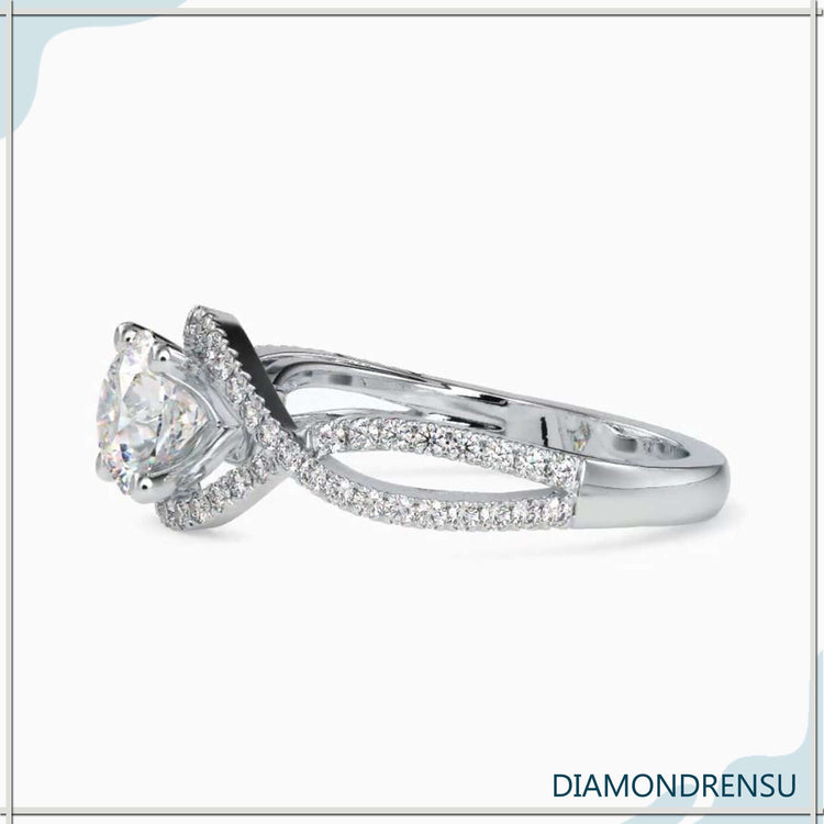 Yellow gold engagement ring featuring a polished round band.