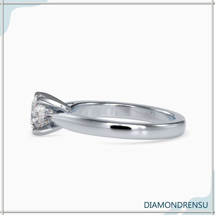 Lab grown diamond engagement ring in tapered shank design.
