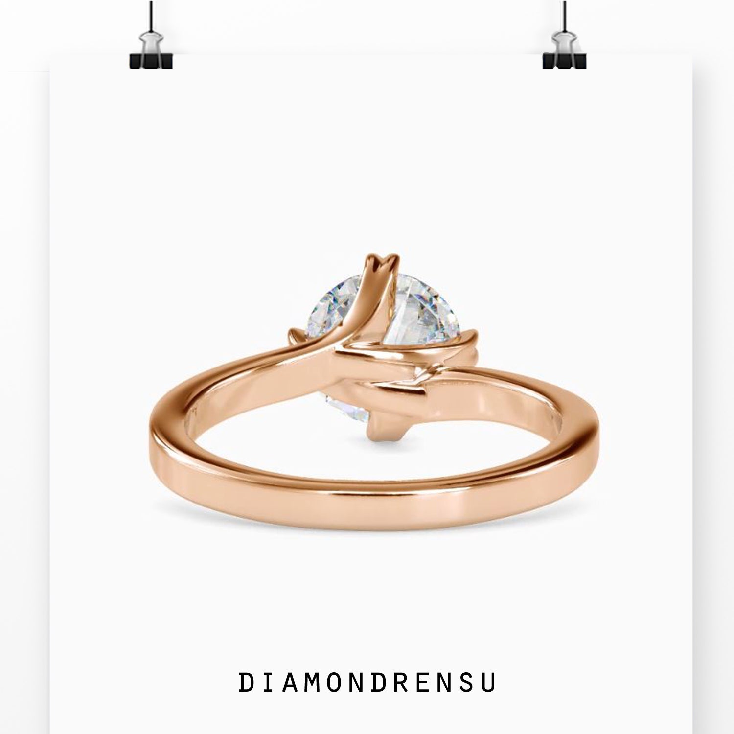 Diamondrensu UK ring with heart prong and round diamond.