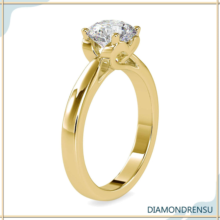 Customise engagement ring with 4 prong hidden heart style.