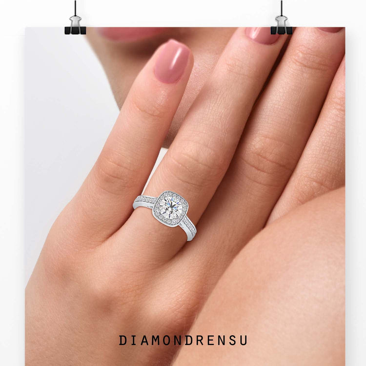 Round cut diamond ring with cathedral setting and bridge accents.