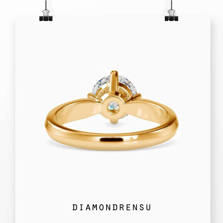 Handmade round cut lab grown diamond ring with basket mount.