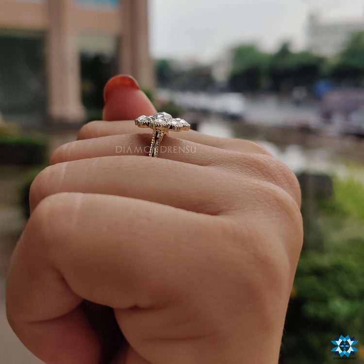 Vintage-inspired cluster ring in warm yellow gold.