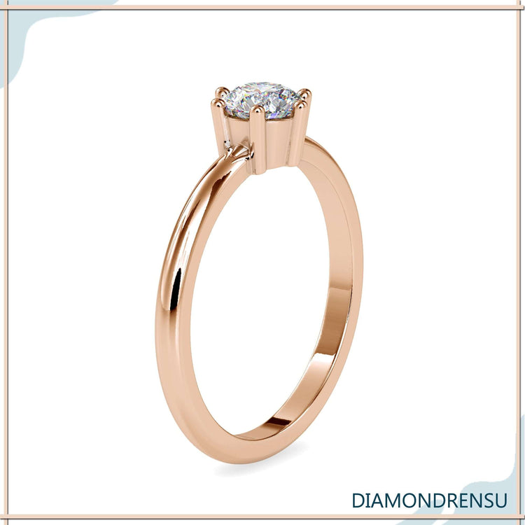 Buy diamond ring with round solitaire in classic six prong style.