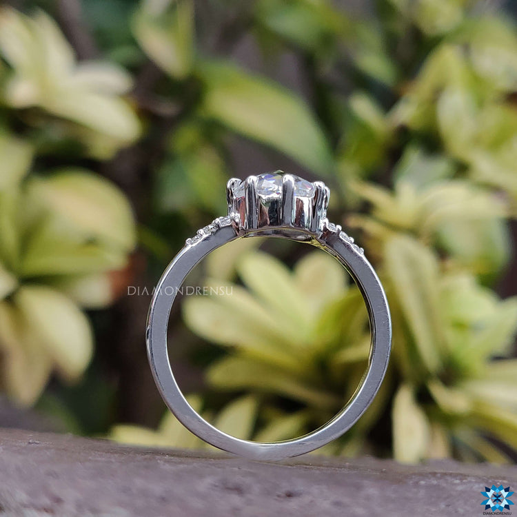 Custom Moissanite engagement ring in white gold with elegant rose cut center.