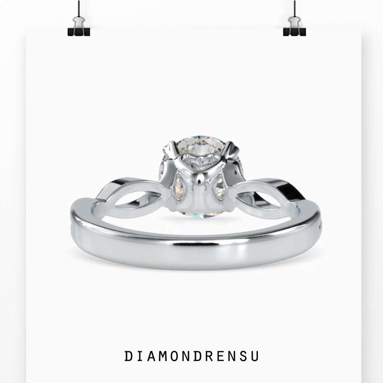 Custom engagement ring with round cut diamond.