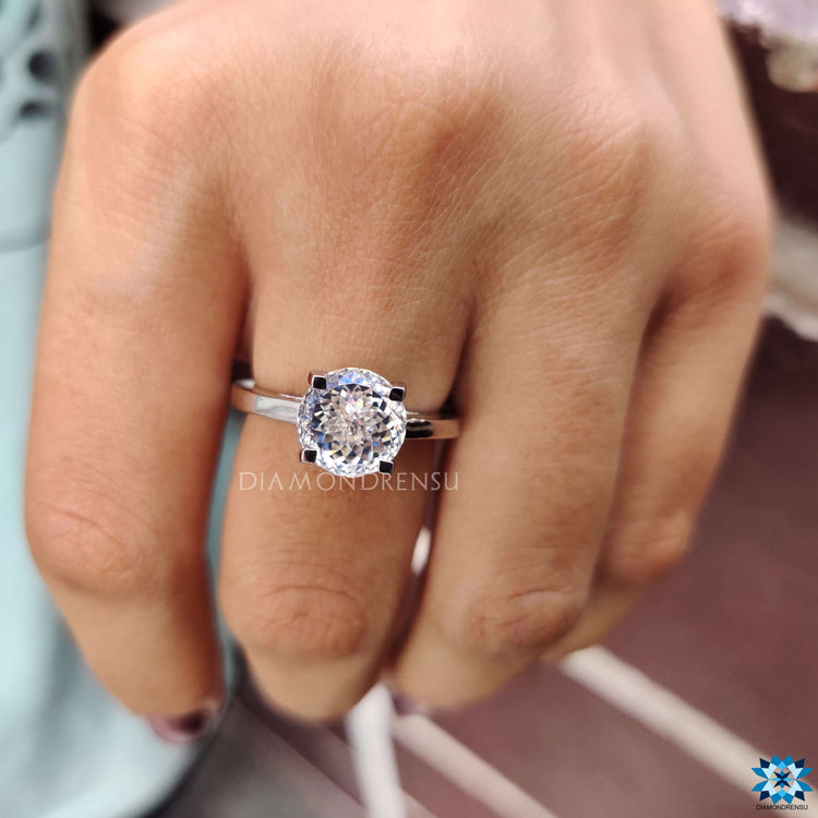 Handmade solitaire ring featuring a Portuguese cut center.