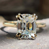 Cushion old European cut moissanite ring in yellow gold.