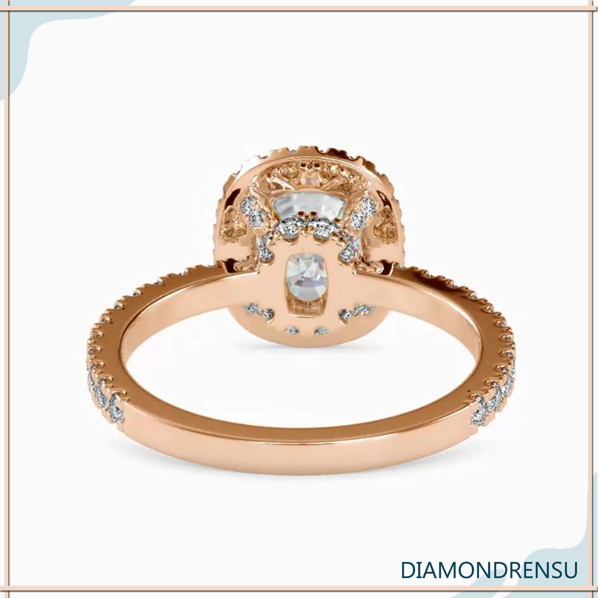 Handmade cushion cut diamond ring in white gold.