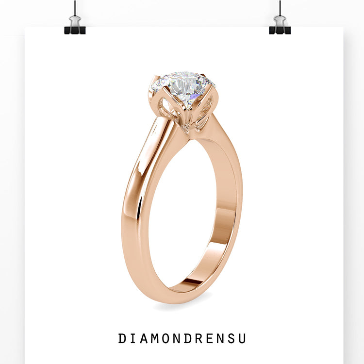 Handmade ring with round diamond and tulip-shaped setting.