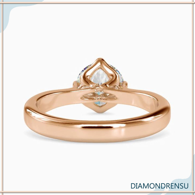Yellow gold diamond ring with 4 prong round setting.