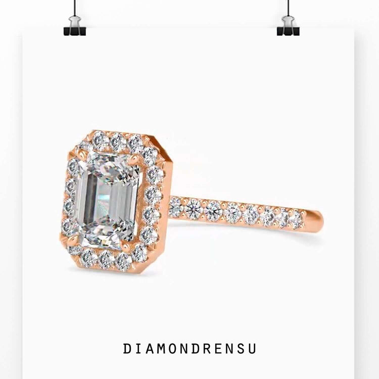 White gold ring with emerald cut and round diamonds.