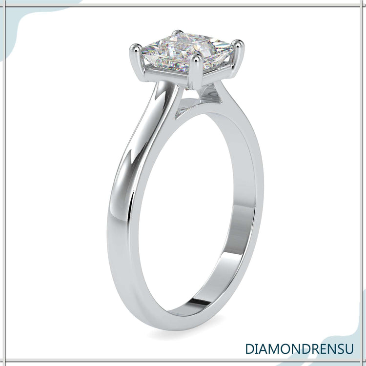 Buy princess diamond ring with cathedral setting in yellow gold.
