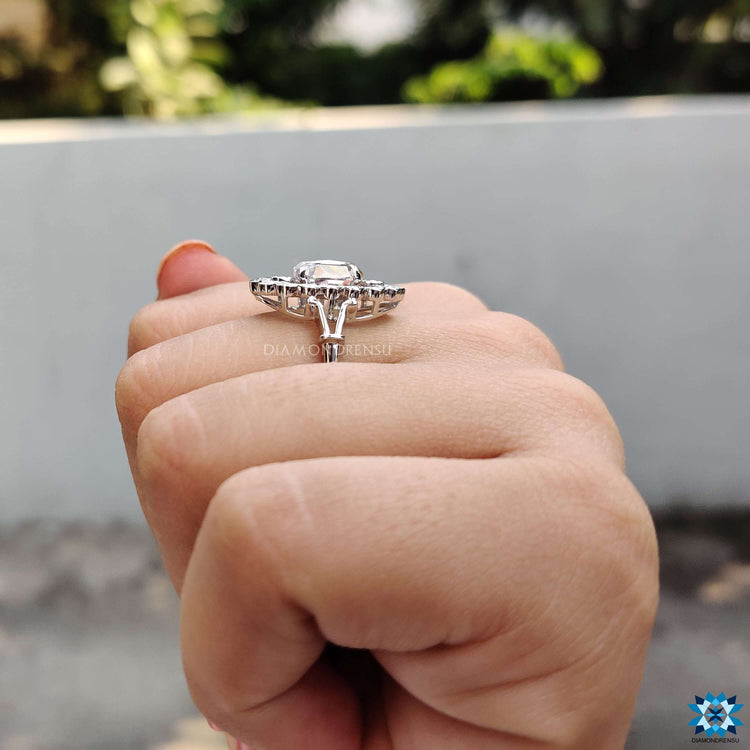 Buy moissanite ring in white gold with vintage halo details.