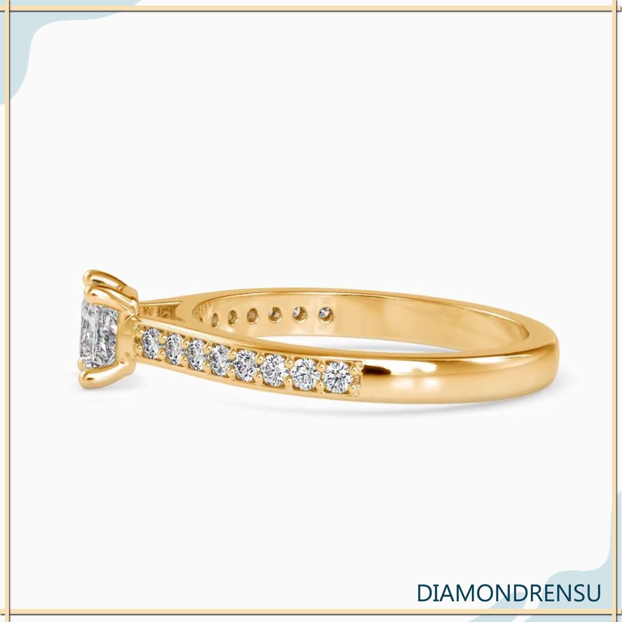 Lab grown diamond ring with channel set side stones.