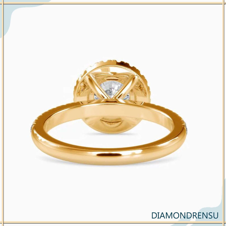 Rose gold halo engagement ring with lab grown diamond.