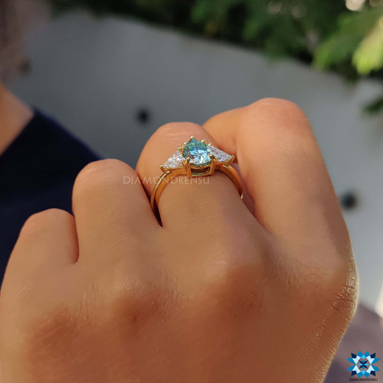 Buy custom yellow gold engagement ring with three stones.