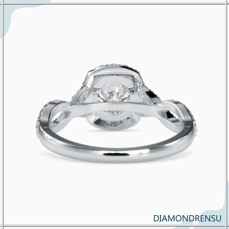 UK engagement ring with round diamond and custom twist band.