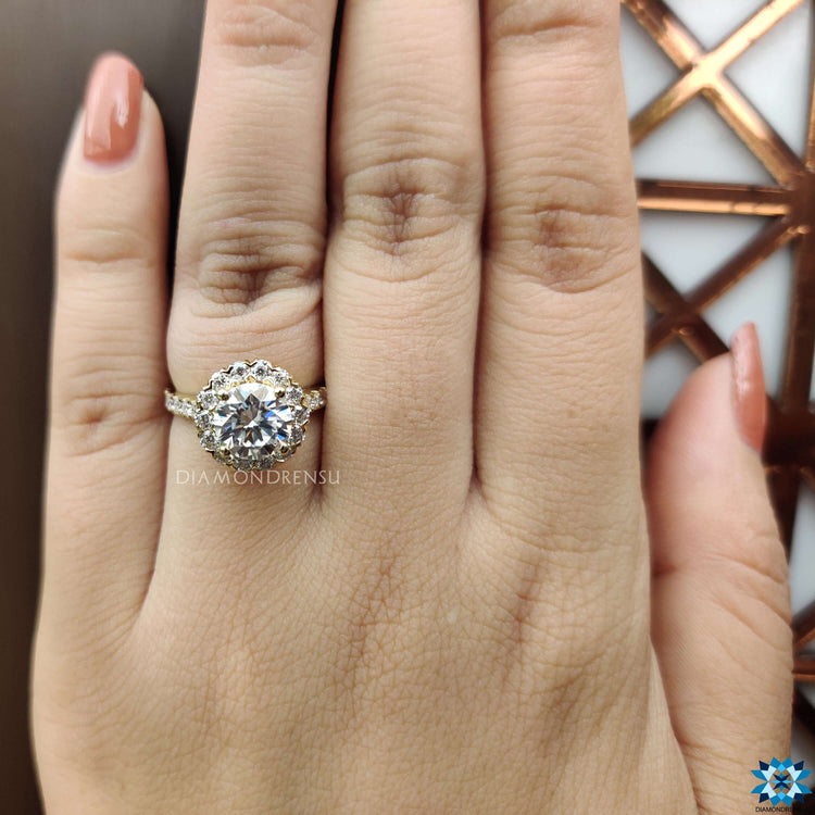 Buy moissanite ring with round cut and white gold band.