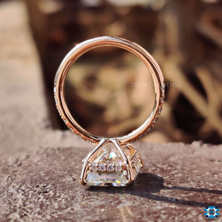 Custom engagement ring with hidden halo and pave setting.