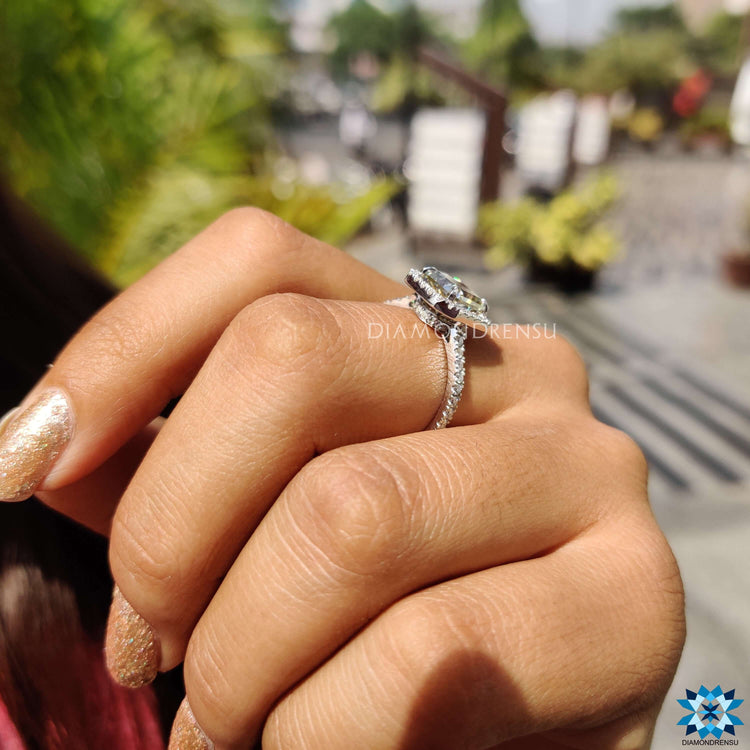 Buy moissanite ring with halo and pave accents in white gold finish.
