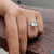 Hidden halo moissanite ring with a radiant cut centre stone. Hidden halo moissanite ring with a radiant cut centre stone.